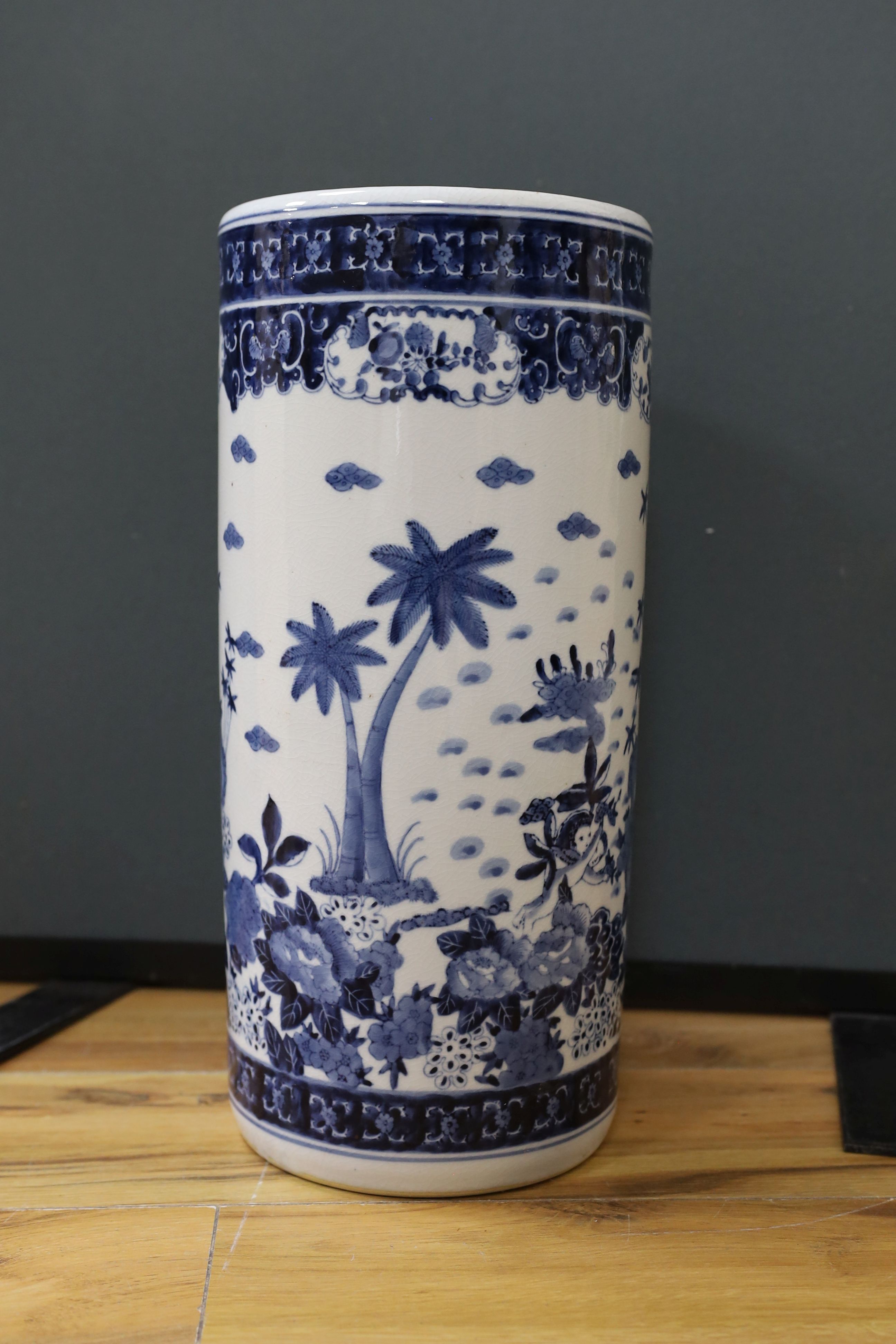 A Chinese blue and white cylindrical stick and umbrella stand, 44cm